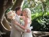 Bride and Groom in Garden with Bridal Bouquet