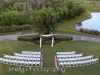 Beautiful wedding arch with aisle flowers