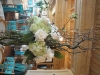 Green hydrangea and orchids with roses and willows centerpiece