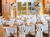 Gorgeous detailed chair draping and reception table centerpieces