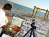 Artists painting Beach Wedding Scene