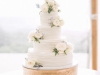 Wedding Cake with White Fresh Roses and Blue Bella Donna Delphinium