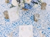 Place setting with Blue Linen and Blue and White Centerpiece