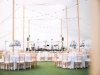 Tent Reception with Blue and White Tall Centerpieces and Head Table