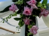 pink-rose-and-green-orchids-on-bamboo-canopy