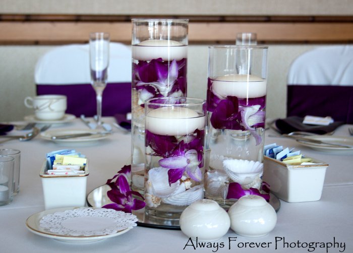 set-of-low-cylinders-with-shells-and-purple-orchids