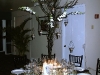 Six foot black iron tree centerpieces with hanging votives