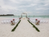 Ceremony Site on Beach with Lanterns and Palm Fronds