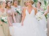 Captivating Shot of Bride with Bridesmaids with Bouquets