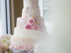 Beautiful Wedding Cake with Re-purposed flowers from Aisle flowers from Ceremony