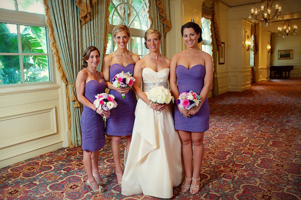 bridal party with pink and lavender flowers