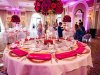 ballroom-with-elevated-arranggemetn-with-table-set-w-hot-pink-napkins