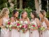 Bride with Bridesmaids featuring pink flowers