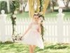 Flower Girl on Swing with Bouquet