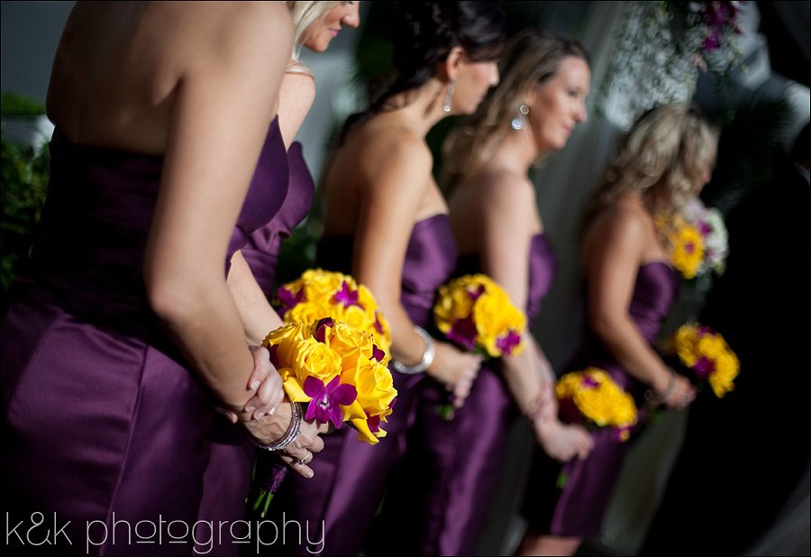 bridesmaids-bouquet-yellow-roses-purple-orchids