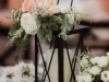 Table Centerpiece with Black Lanterns and Roses on Top