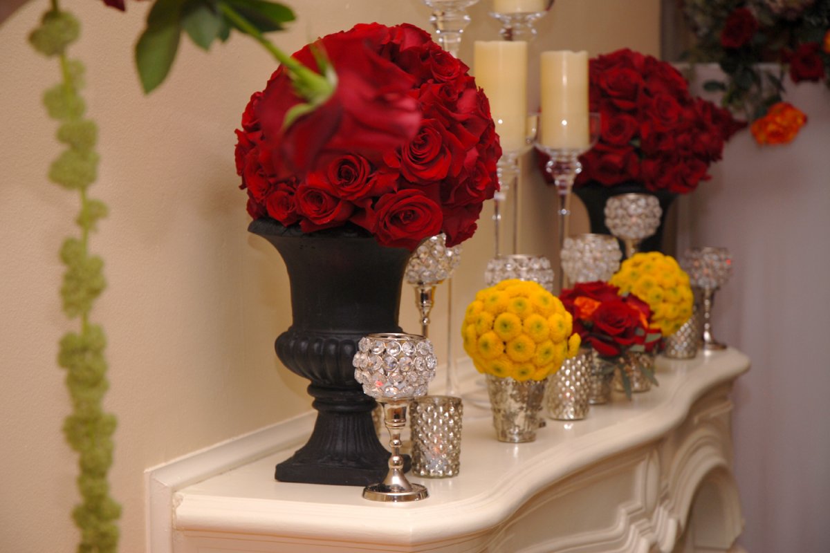 Mantel with topiaries and candles