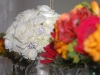 Bridal bouquets with roses, ranunculus and bling