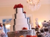 Black and white bridal cake with red roses