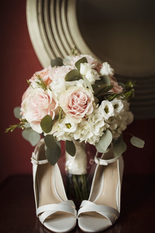 Pink Mondial Roses Shimmer Roses Nested into Hydrangea White Lisianthus and Silver Dollar Eucalyptus
