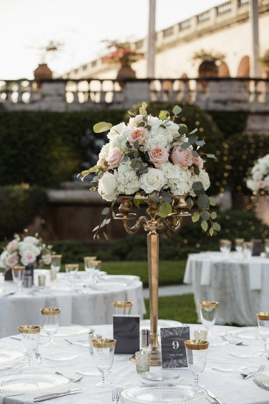 Elevated Guest Table Centerpiece on Gold Candelabra with Blush, Cream, and Peach Garden-Look Flowers