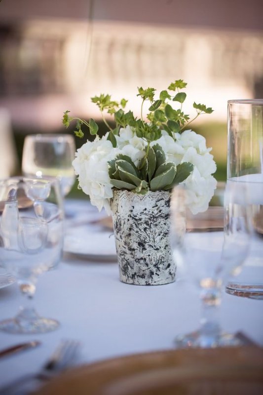 centerpiece_of_merc_cup_with_hydrangea_and_greenery