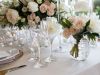 Close up of Small Floral Arrangement on Table in Blush and White