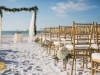 Arch with Garland and Flowers, Aisle Flowers Used Later for Centerpiece
