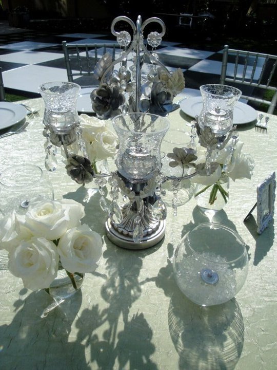 silver-candleabrum-wtih-crystals-and-white roses