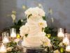 Wedding  Cake with Fresh  Peonies Flowers and Candles